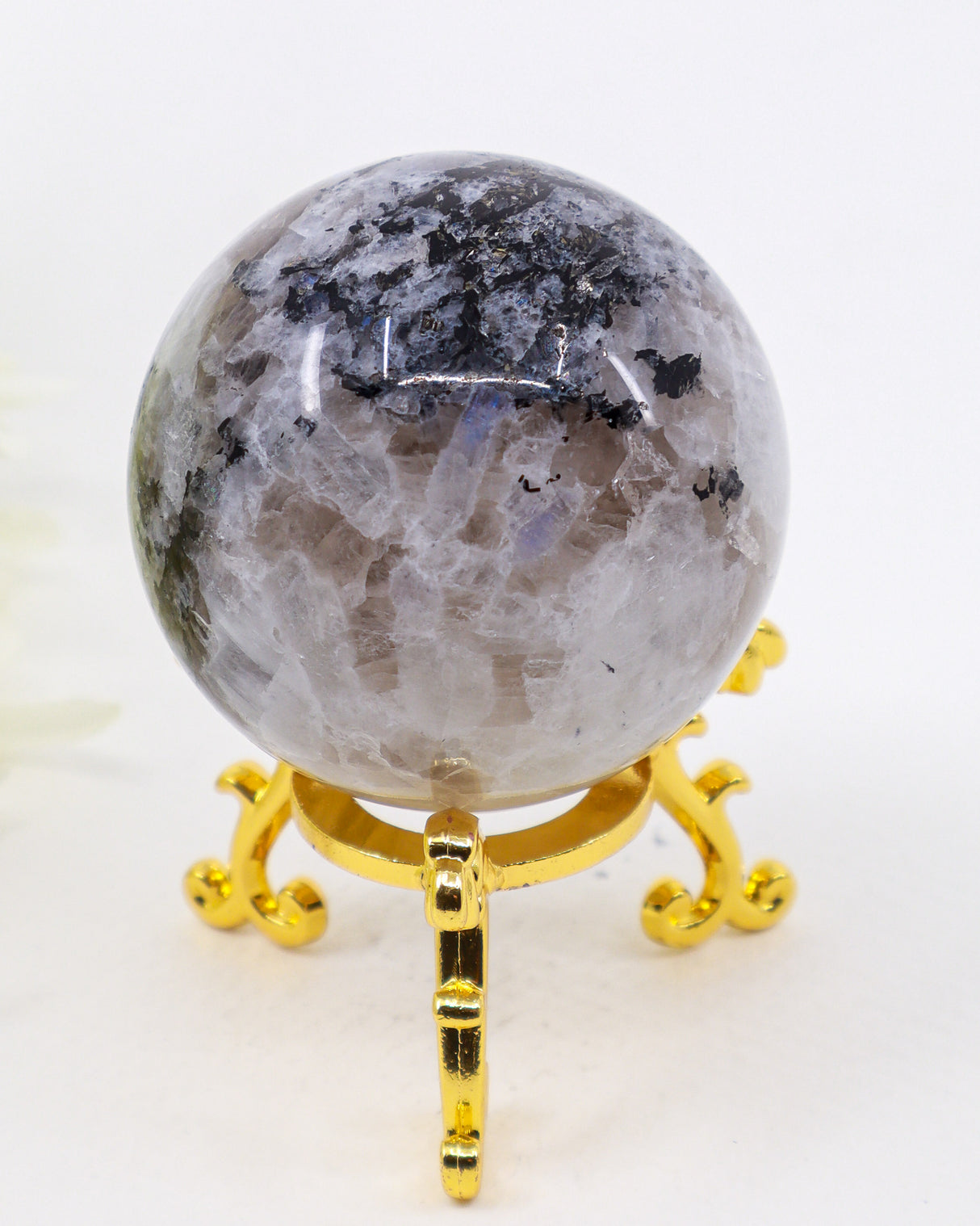 205g Rainbow Moonstone Sphere with natural blue flash, silvery white feldspar crystals and black inclusions, polished into a premium crystal sphere.