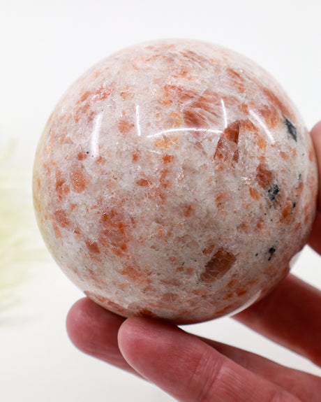 Natural Sunstone Sphere with Black Tourmaline Inclusions 699g – 8.5cm | Joy, Protection & Personal Power Crystal