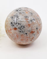 Natural Sunstone Sphere with Black Tourmaline Inclusions 699g – 8.5cm | Joy, Protection & Personal Power Crystal