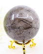 Premium 319g Black Tourmalinated Quartz crystal sphere with natural black Tourmaline inclusions and display stand.