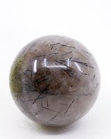 Black Tourmalinated Quartz Sphere 319g – A Crystal of Protection & Clarity