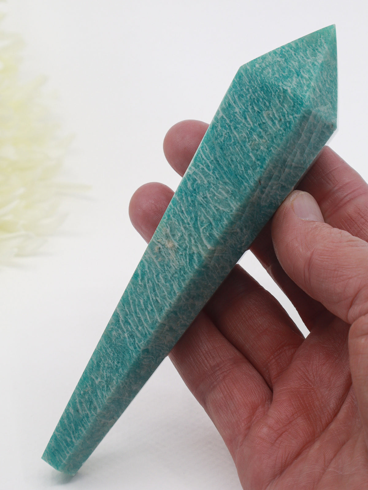 Natural Amazonite crystal wand 180g 16cm with turquoise blue-green and white feldspar patterning, polished point and gold display stand.
