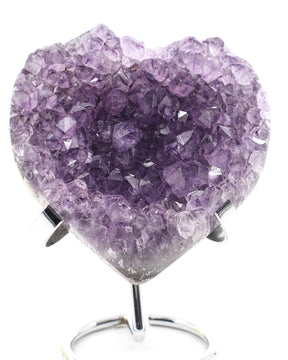 Lavender Amethyst Crystal Heart with sparkling druzy crystal formations displayed on a metal stand associated with peace, emotional healing and spiritual wisdom.