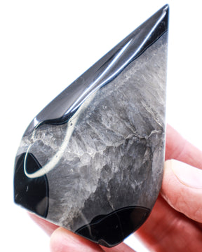 Black Banded Agate Flame 141g with glossy black bands and smoky grey crystalline centre, polished 8.5cm protection and grounding crystal.