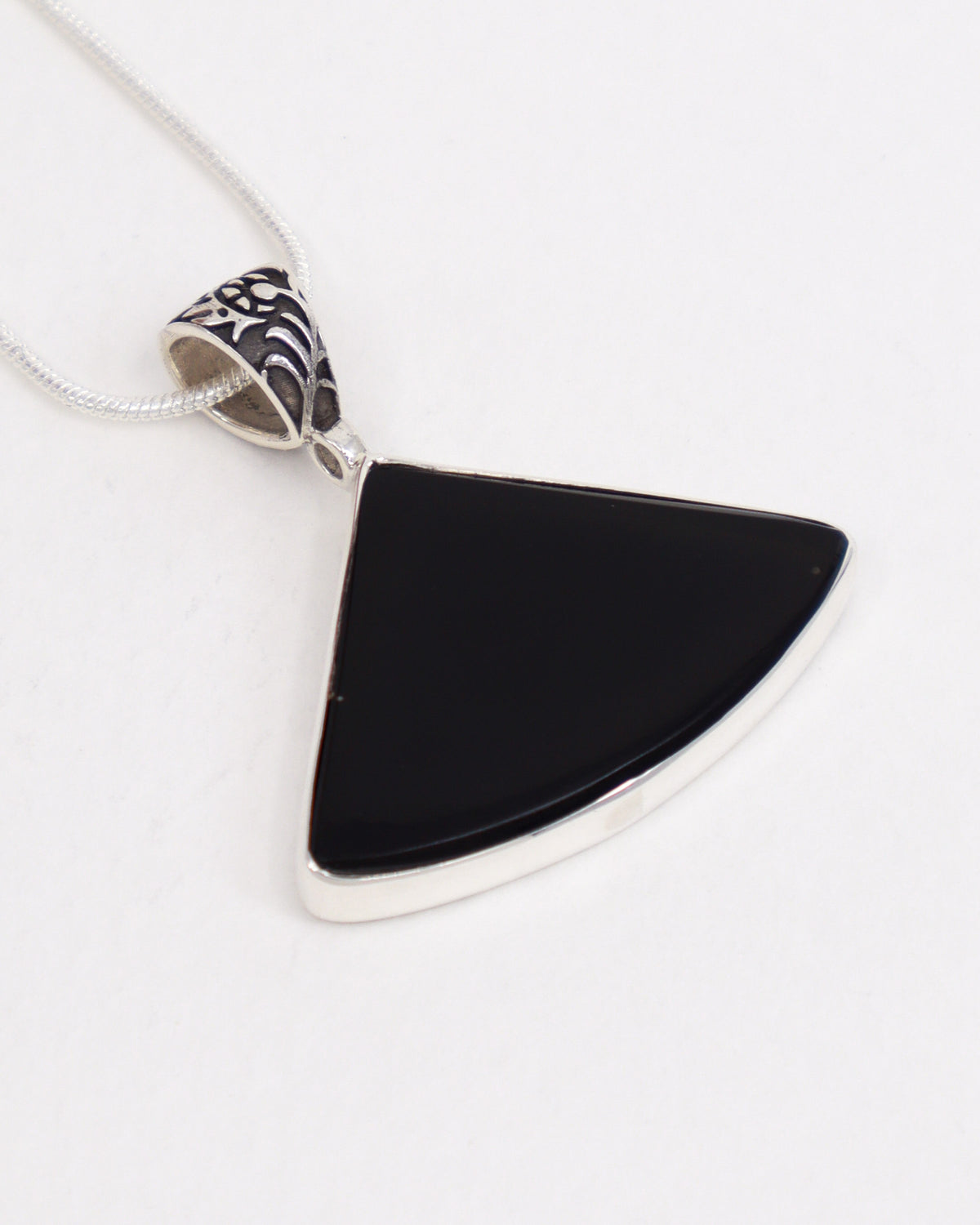 Natural Black Obsidian sterling silver pendant with polished black fan-shaped gemstone and decorative .925 silver bail.