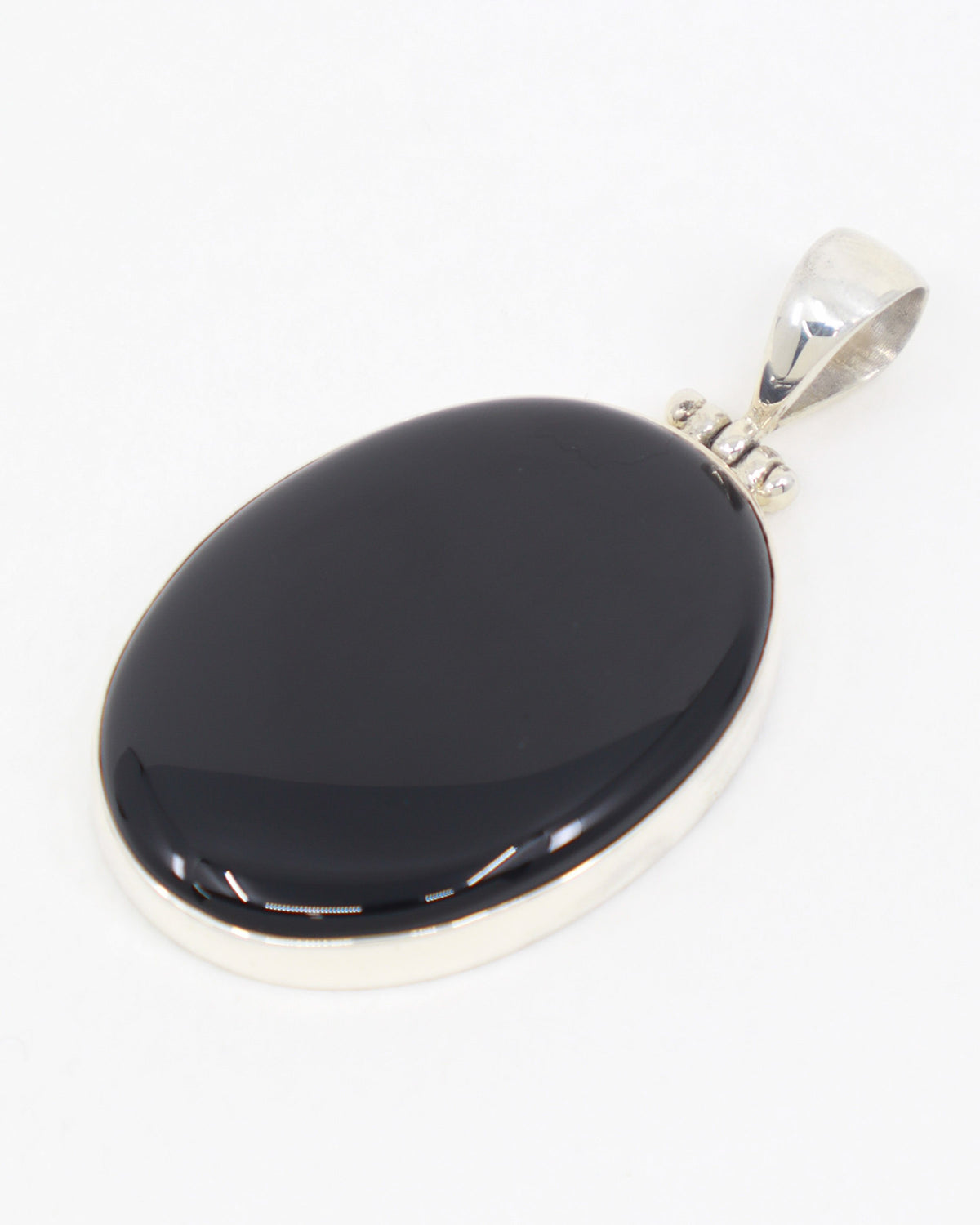 Black Onyx Sterling Silver Pendant – The Stone of Resolve | Strength & Protection