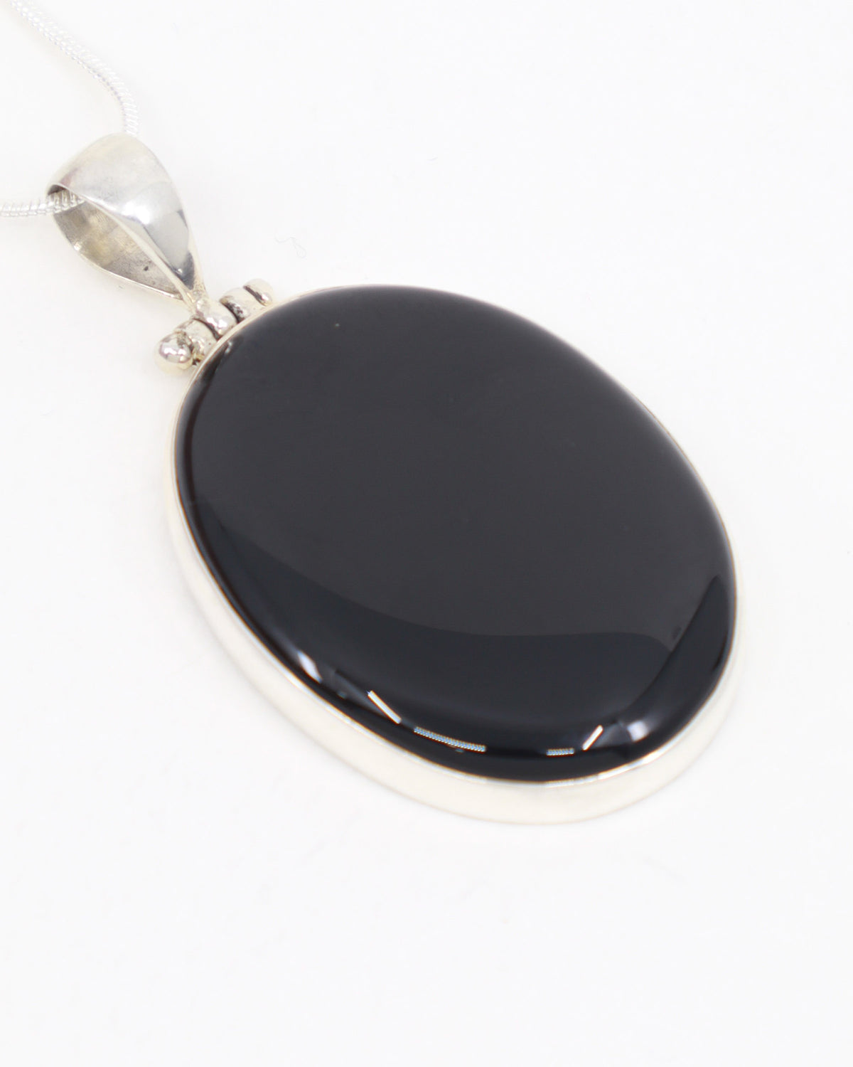 Black Onyx Sterling Silver Pendant – The Stone of Resolve | Strength & Protection