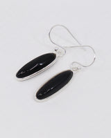 Black Onyx sterling silver drop earrings with polished elongated oval gemstones in .925 silver, grounding protection crystal jewellery Australia.