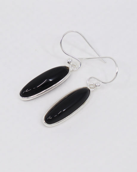 Black Onyx sterling silver drop earrings with polished elongated oval gemstones in .925 silver, grounding protection crystal jewellery Australia.