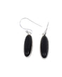 Black Onyx sterling silver drop earrings with polished elongated oval gemstones in .925 silver, grounding protection crystal jewellery Australia.
