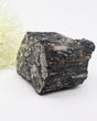 Large raw Black Tourmaline with Pink Feldspar specimen 1.242kg featuring natural black striated Tourmaline crystals and salmon pink mineral veins.