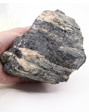 Large natural Black Tourmaline with pink feldspar 1.559kg raw crystal specimen with black striated Tourmaline crystals and contrasting pink mineral formations.