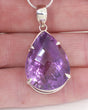 High quality Brazilian Amethyst teardrop pendant in 0.925 sterling silver with faceted violet gemstone and complimentary silver snake chain.