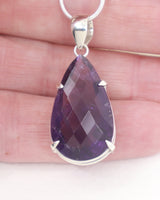 High quality Brazilian Amethyst teardrop pendant in 0.925 sterling silver with deep violet faceted gemstone and silver snake chain.