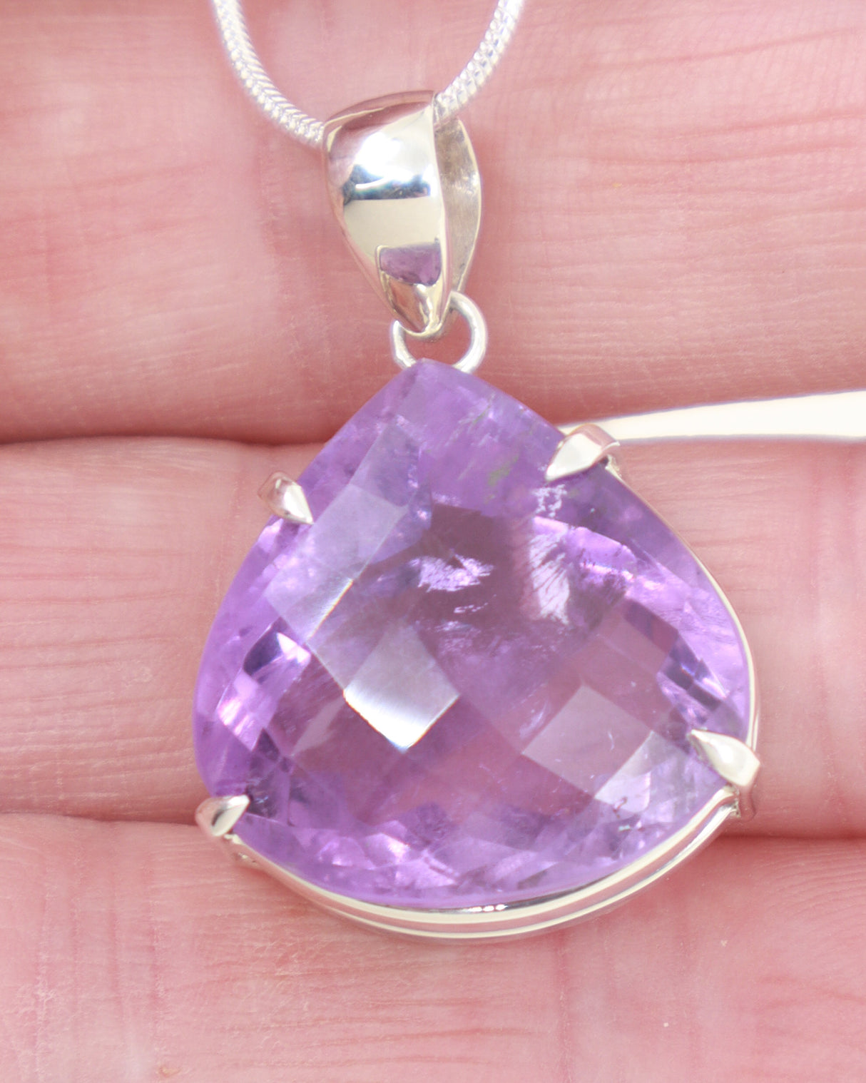 High quality Brazilian Amethyst pear pendant with luminous lavender violet faceted gemstone set in 0.925 sterling silver.
