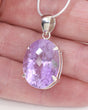 Brazilian Amethyst oval pendant in .925 sterling silver with faceted lavender purple crystal