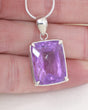 Brazilian Amethyst rectangular faceted pendant in .925 sterling silver with violet purple crystal