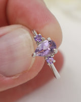 Brazilian Amethyst three stone sterling silver ring size 7 with pear-cut purple Amethyst and two round gemstones in .925 silver Australia.
