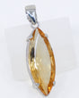 Brazilian Citrine Solar Flame sterling silver pendant with large elongated faceted golden Citrine gemstone in .925 silver.