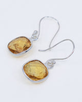 Natural Citrine earrings in .925 sterling silver with faceted golden yellow gemstones, abundance and manifestation crystal jewellery Australia.