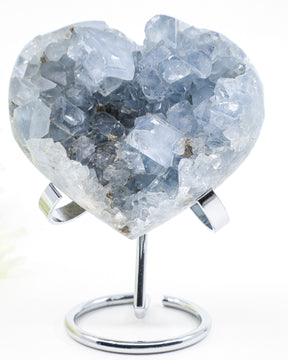 Celestite Crystal Heart on silver stand featuring sparkling pale blue crystal points and natural druzy formations, weighing 801g.