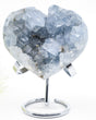 Celestite Crystal Heart on silver stand featuring sparkling pale blue crystal points and natural druzy formations, weighing 801g.