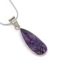 Natural Charoite sterling silver pendant with swirling violet and lavender patterns, elongated teardrop purple crystal pendant with silver chain.