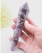 Natural Chevron Amethyst crystal wand 158g 16cm with purple and white quartz banding, polished point and gold display stand.
