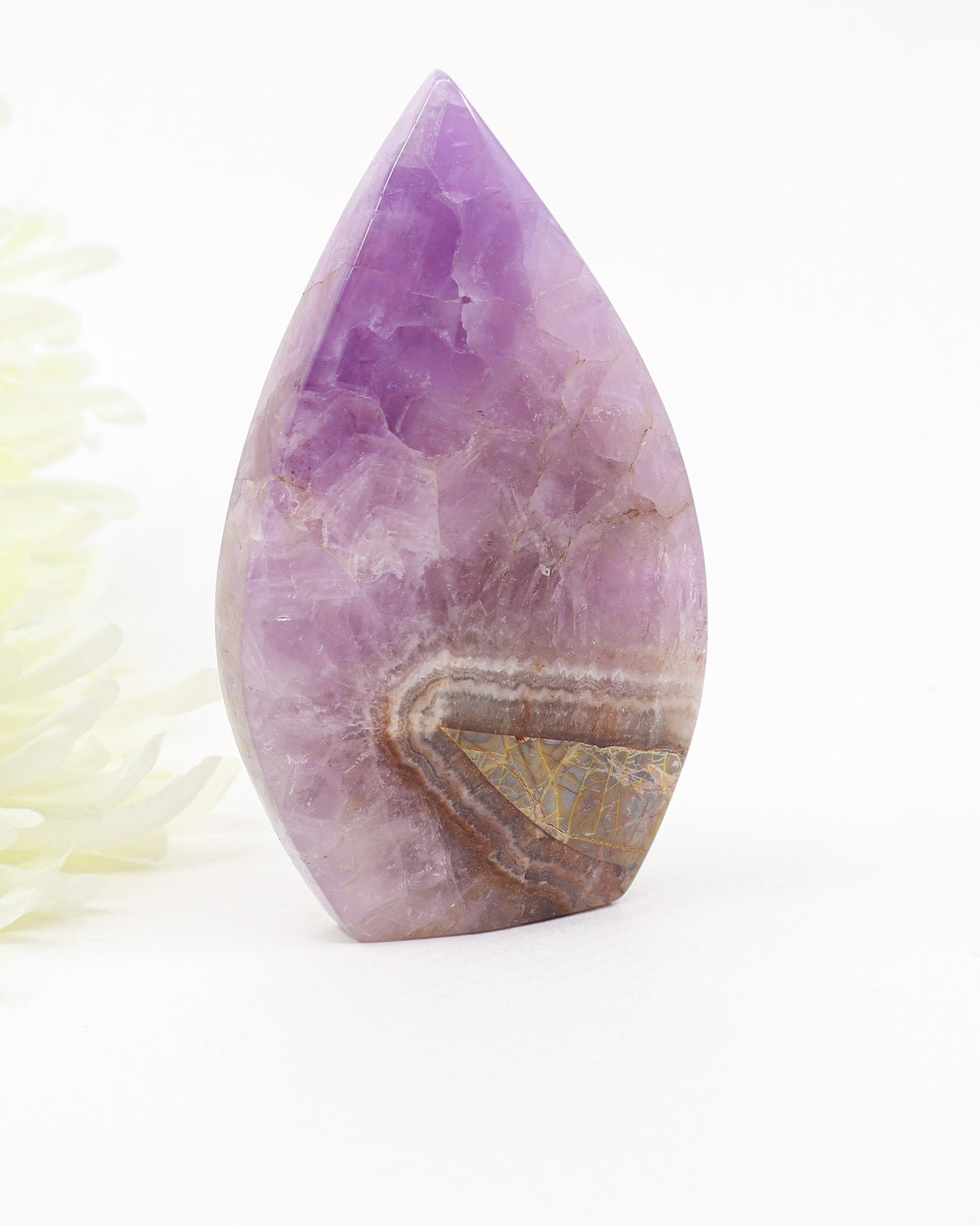 Beautiful Chevron Amethyst freeform featuring soft lavender tones, natural banding and unique matrix formations. Associated with intuition, clarity and spiritual growth.