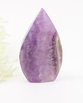 Polished Chevron Amethyst freeform featuring natural lavender and violet banding with Quartz inclusions associated with intuition, spiritual awareness and energetic protection.