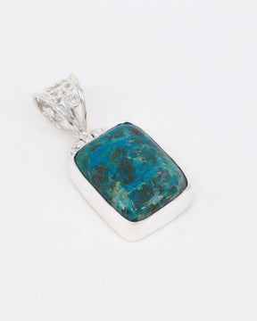 Natural Chrysocolla sterling silver pendant with vivid turquoise blue and green mineral patterns, rectangular Chrysocolla gemstone and ornate silver bail.