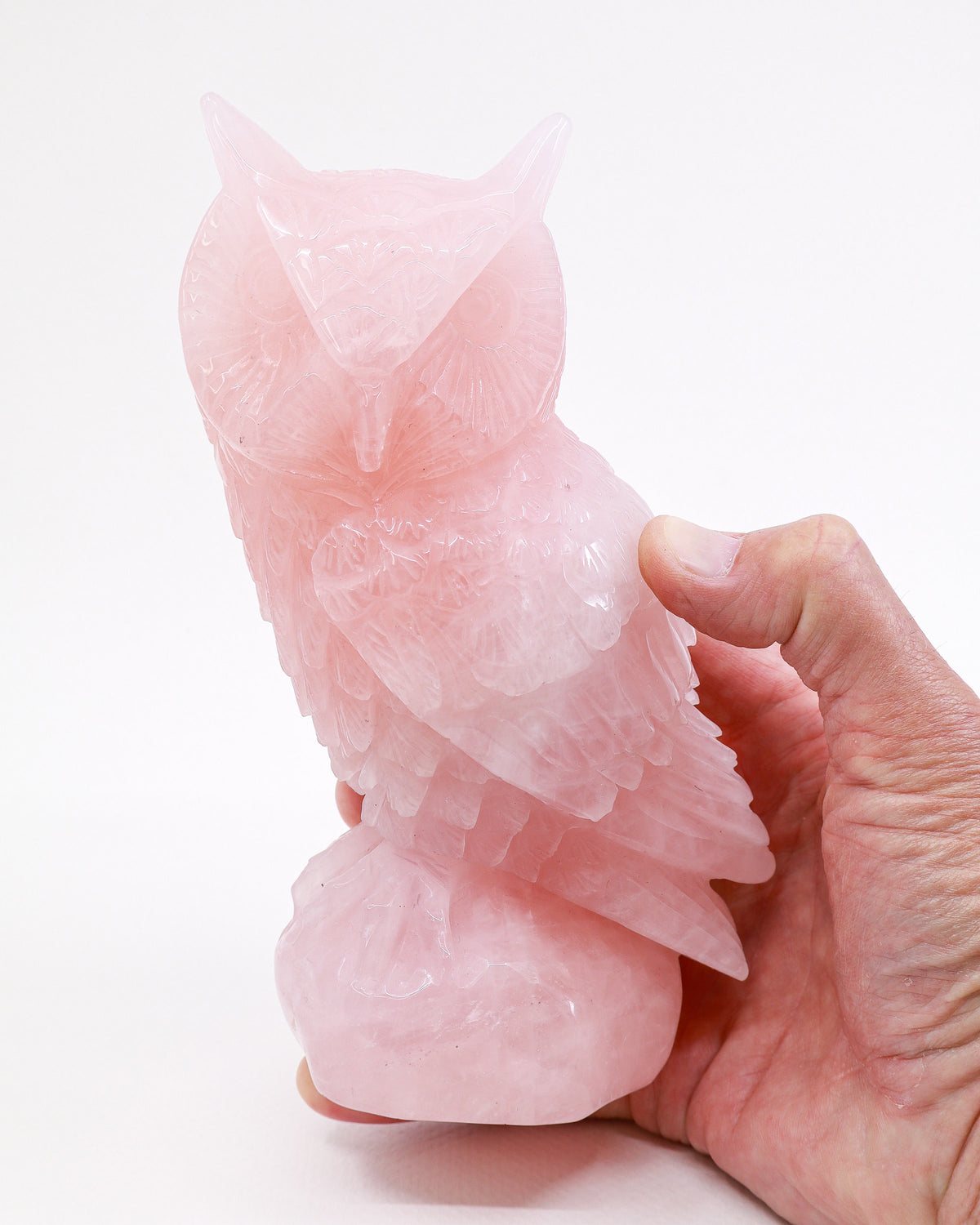 Large Rose Quartz Owl Carving 1.517kg, hand-carved pink crystal owl statue with detailed feathers, symbolising love, wisdom and compassion.