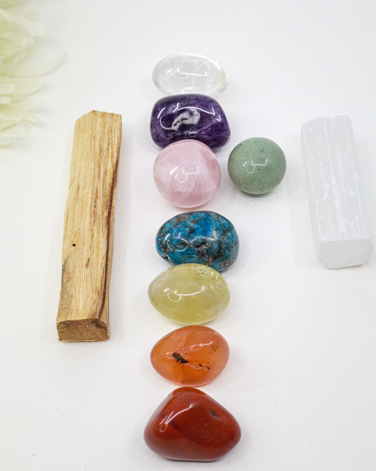 8 crystal chakra healing kit with Red Jasper, Carnelian, Lemon Quartz, Green Aventurine, Rose Quartz, Blue Apatite, Amethyst, Clear Quartz, Selenite wand and Palo Santo.
