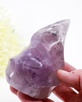 Natural Amethyst Flame 515g with translucent pale lavender and violet colouring, clear crystal areas and beautiful internal formations, polished purple crystal flame.