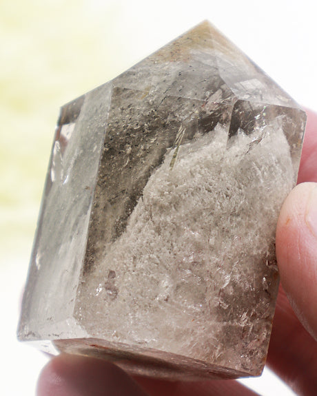 Garden Quartz Lodolite crystal point 130g featuring cloudy white scenic inclusions and earthy mineral formations.
