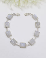 Rainbow Moonstone sterling silver bracelet with rectangular glowing moonstone cabochons and polished .925 silver links.