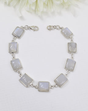Rainbow Moonstone sterling silver bracelet with rectangular glowing moonstone cabochons and polished .925 silver links.
