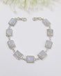 Rainbow Moonstone sterling silver bracelet with rectangular glowing moonstone cabochons and polished .925 silver links.