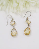 Natural faceted Citrine sterling silver drop earrings with warm golden gemstones photographed on a soft cream background by Inspired By 3 Australia.