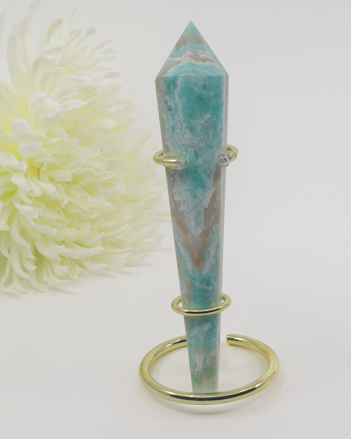 Natural blue Hemimorphite crystal wand 140g with aqua blue, white and cream banding, natural cavities and gold display stand.