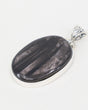 Natural Hypersthene sterling silver pendant with dark charcoal stone, silvery bronze flash, oval gemstone and ornate .925 silver bail.