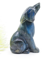 Labradorite Wolf Carving with vibrant blue flash and natural labradorescence weighing 457g.