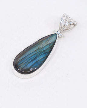 Natural Labradorite sterling silver pendant 5cm with vivid blue, aqua, green and golden flash, elongated teardrop gemstone and ornate silver bail.