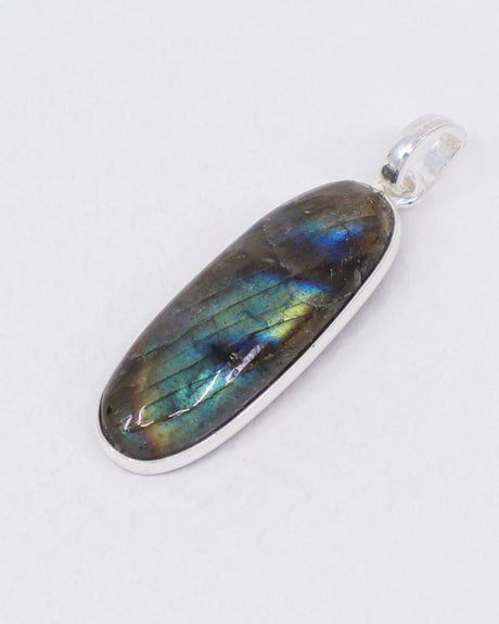 Natural Labradorite sterling silver pendant with vivid electric blue, turquoise, green and golden flash, elongated oval Labradorite crystal pendant in .925 silver.