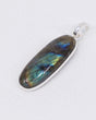 Natural Labradorite sterling silver pendant with vivid electric blue, turquoise, green and golden flash, elongated oval Labradorite crystal pendant in .925 silver.