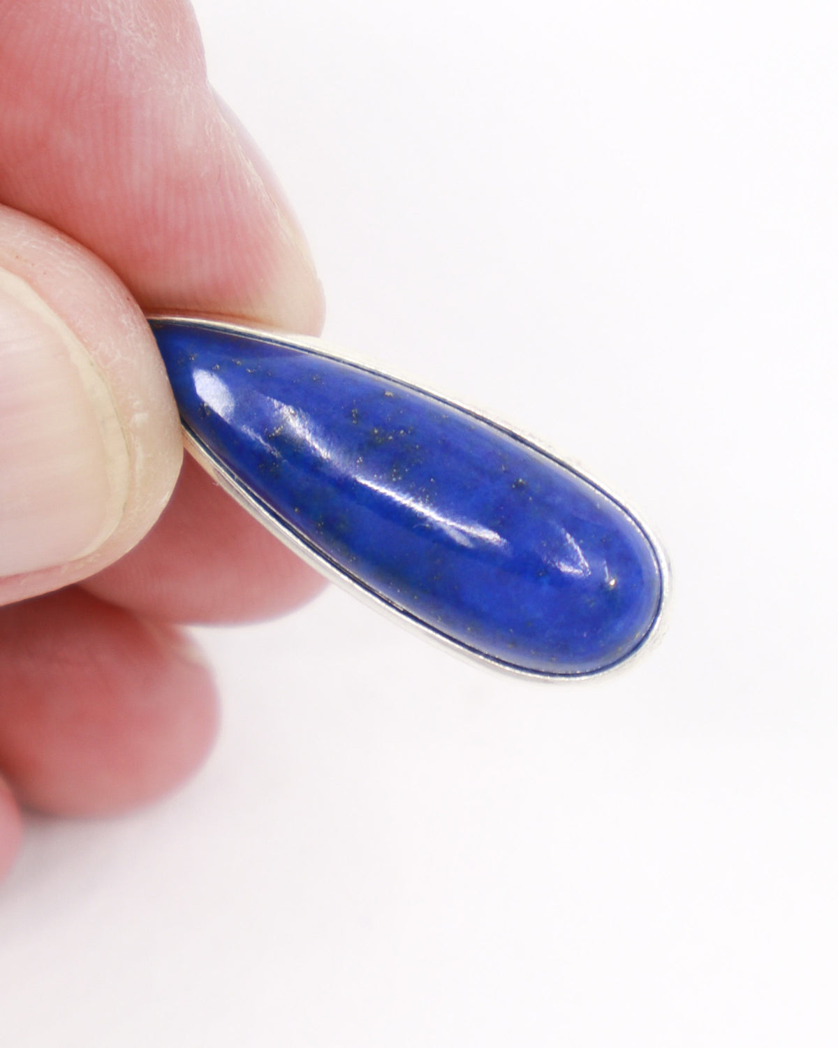 Natural Lapis Lazuli sterling silver pendant with rich royal blue elongated teardrop stone and golden pyrite, blue crystal jewellery Australia.