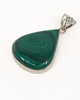 Large natural Malachite sterling silver pendant with striking concentric emerald green banding, teardrop gemstone and ornate .925 silver bail.