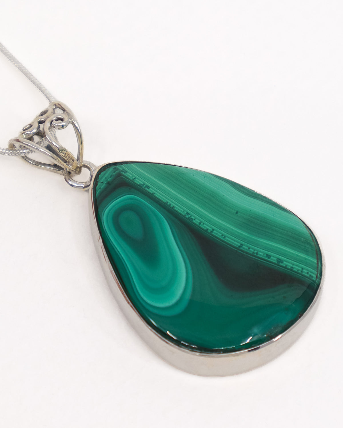 Natural Malachite sterling silver pendant with vivid green eye banding, large teardrop gemstone and ornate .925 silver bail.