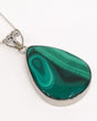 Natural Malachite sterling silver pendant with vivid green eye banding, large teardrop gemstone and ornate .925 silver bail.