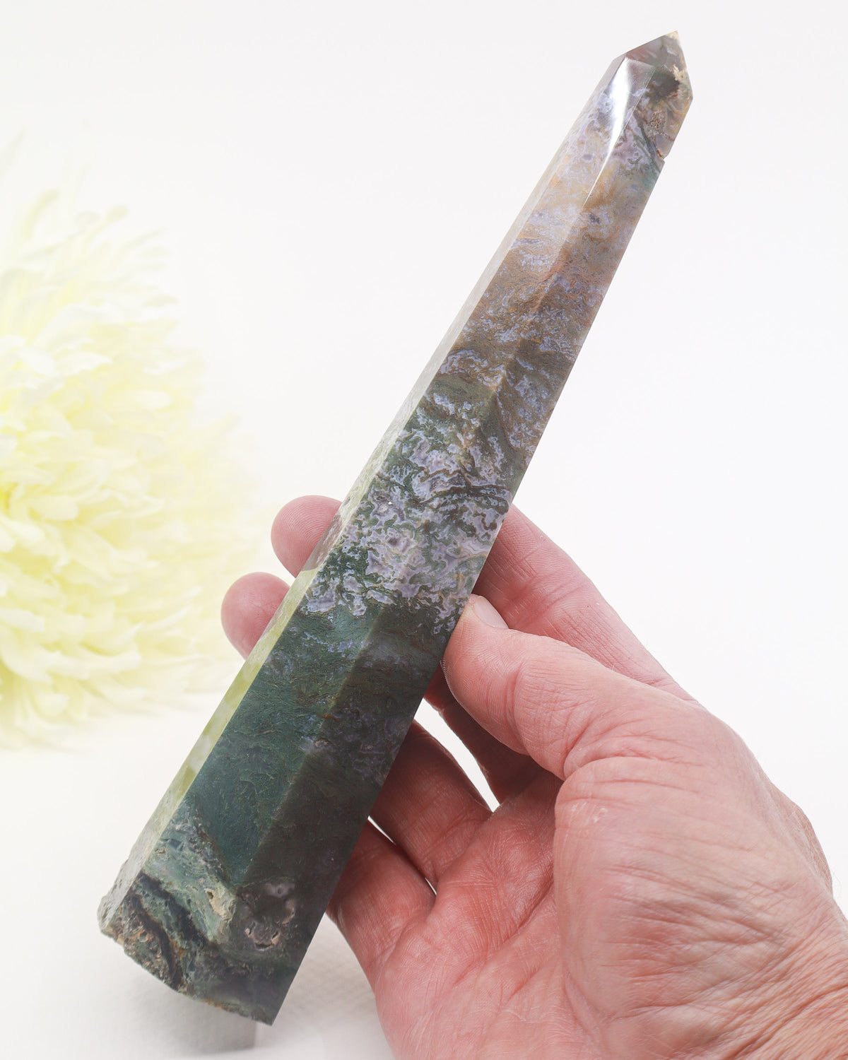 Natural Moss Agate tower 334g 21cm with forest green, brown and grey moss-like patterns, polished crystal point and natural formations.